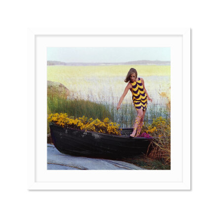 Model In Rowboat Filled With Yellow Flowers Постер в Самаре 